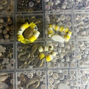 These are a bundle with yellow leafs,shells and patterns clay bead bracelet’s